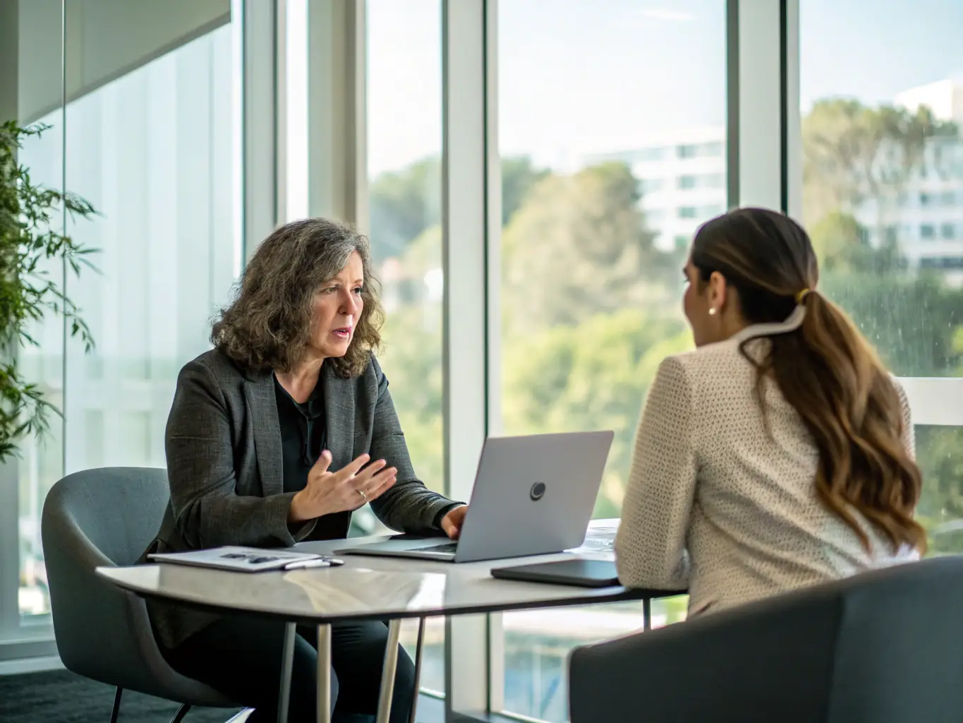 A negotiation skills coach is presenting a webinar on effective negotiation strategies, using visual aids and engaging with participants through a Q&A session.